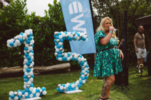 Brooke Sylvia singing at the party