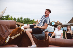 Adult on the bucking broncho