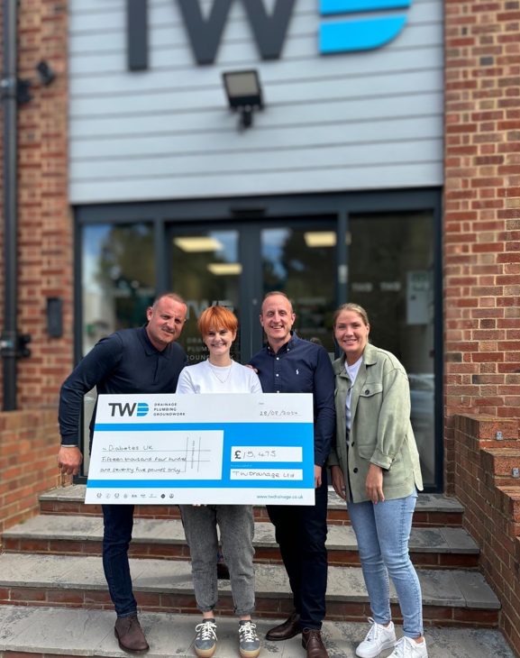 Tom, Sacha, Billy and Stacie with the fundraising cheque